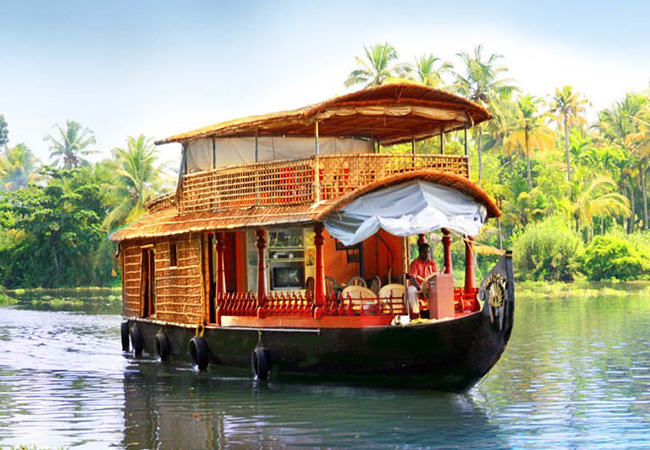 7 Nights 8 Days Cochin Munnar Thekkady Alleppey Houseboat Kovalam Kerala Honeymoon Tour Package